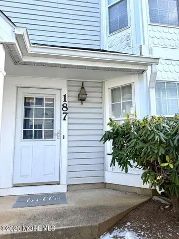 a front view of a house with a garage
