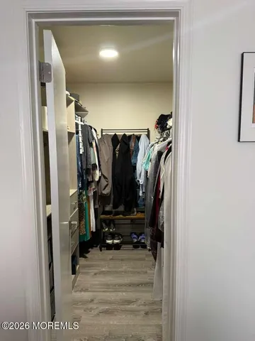 a bathroom with a shower and toilet