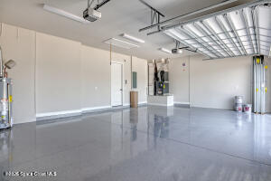 4195 Negal Circle Melbourne, FL 32901 - Photo 15 of 17 a view of a hallway with wooden floor