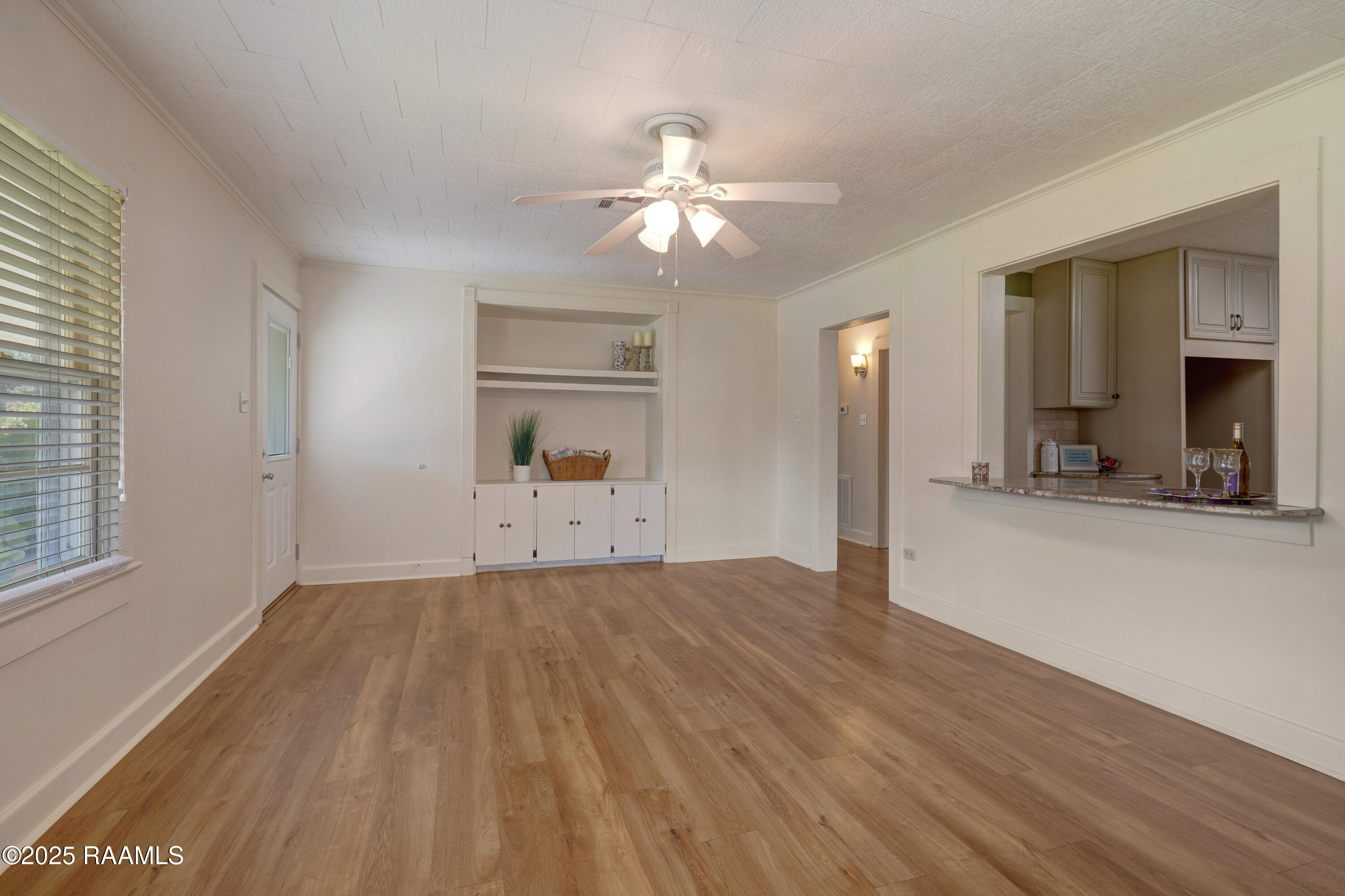 317 Indest Street New Iberia, LA 70563 - Photo 3 of 29 Den with Builtins & Snackbar Area