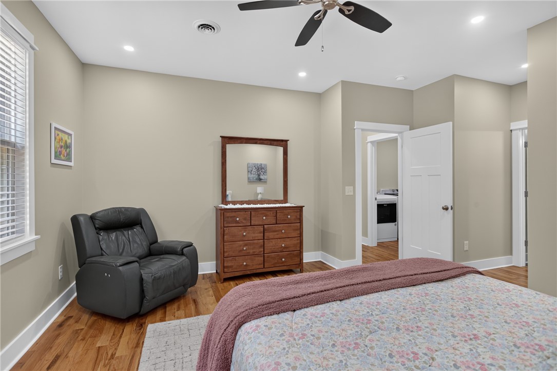405 Pawnee Drive Walhalla, SC 29691 - Photo 11 of 36 Comfortable bedroom with gleaming hardwood floors and ample natural illumination.