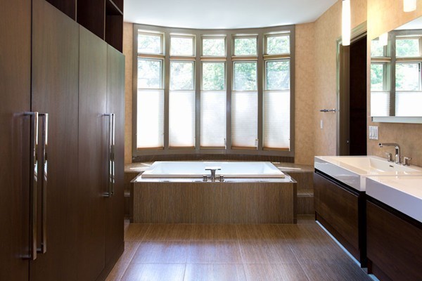 136 Laurel Road Brookline, MA 02467 - Photo 14 of 18 a spacious bathroom with a tub a sink and a mirror