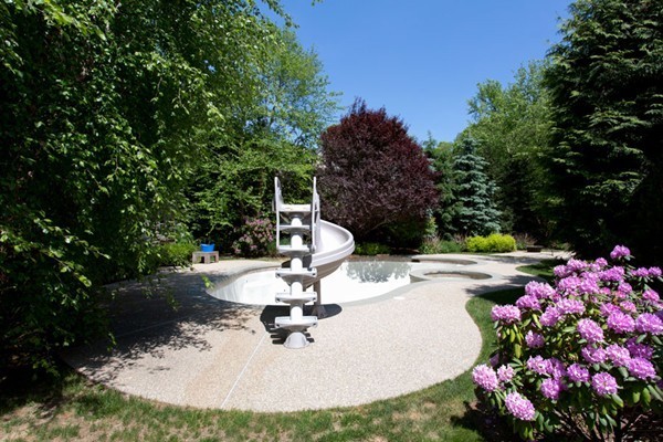 136 Laurel Road Brookline, MA 02467 - Photo 17 of 18 a view of a backyard with sitting area