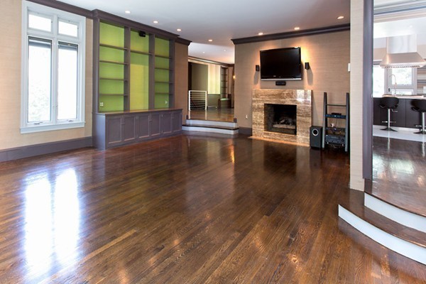136 Laurel Road Brookline, MA 02467 - Photo 6 of 18 a living room with furniture fireplace and flat screen tv