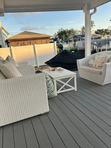 a view of a terrace with wooden floor