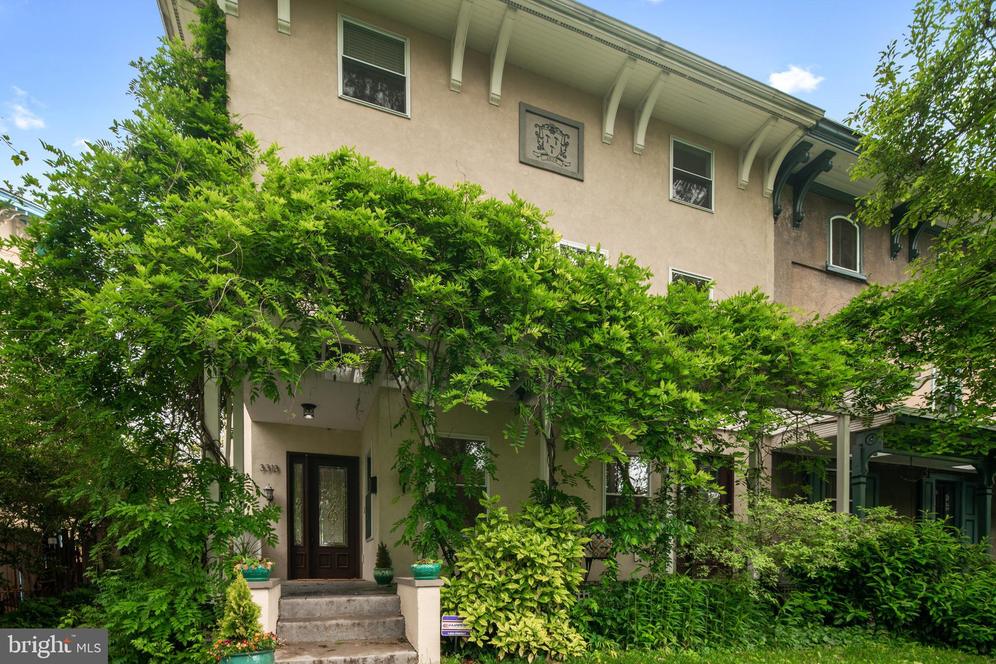 3313 Baring Street Philadelphia, PA 19104 - Photo 2 of 55 a front view of a house with plants