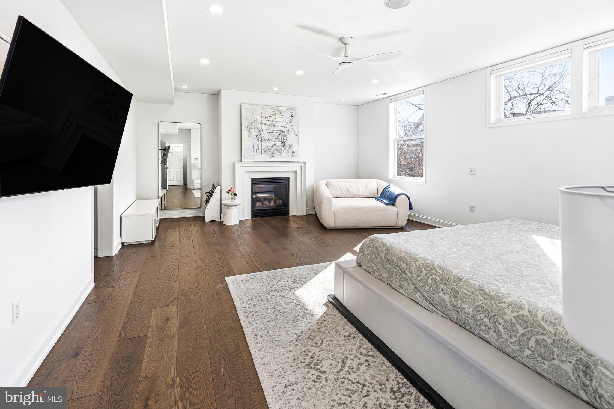 3313 Baring Street Philadelphia, PA 19104 - Photo 32 of 55 a living room with furniture and a flat screen tv