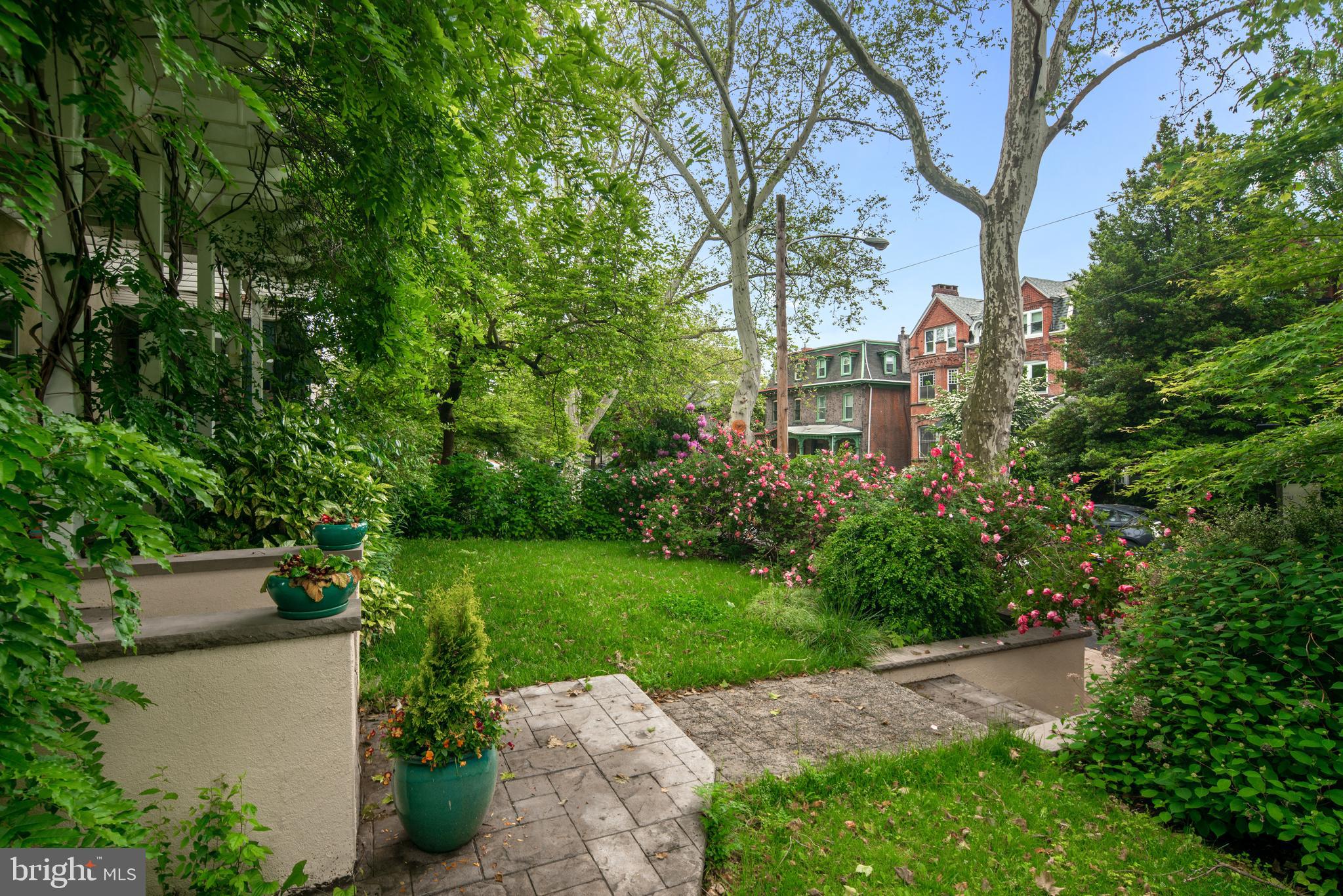 3313 Baring Street Philadelphia, PA 19104 - Photo 4 of 55 a front view of a house with a yard