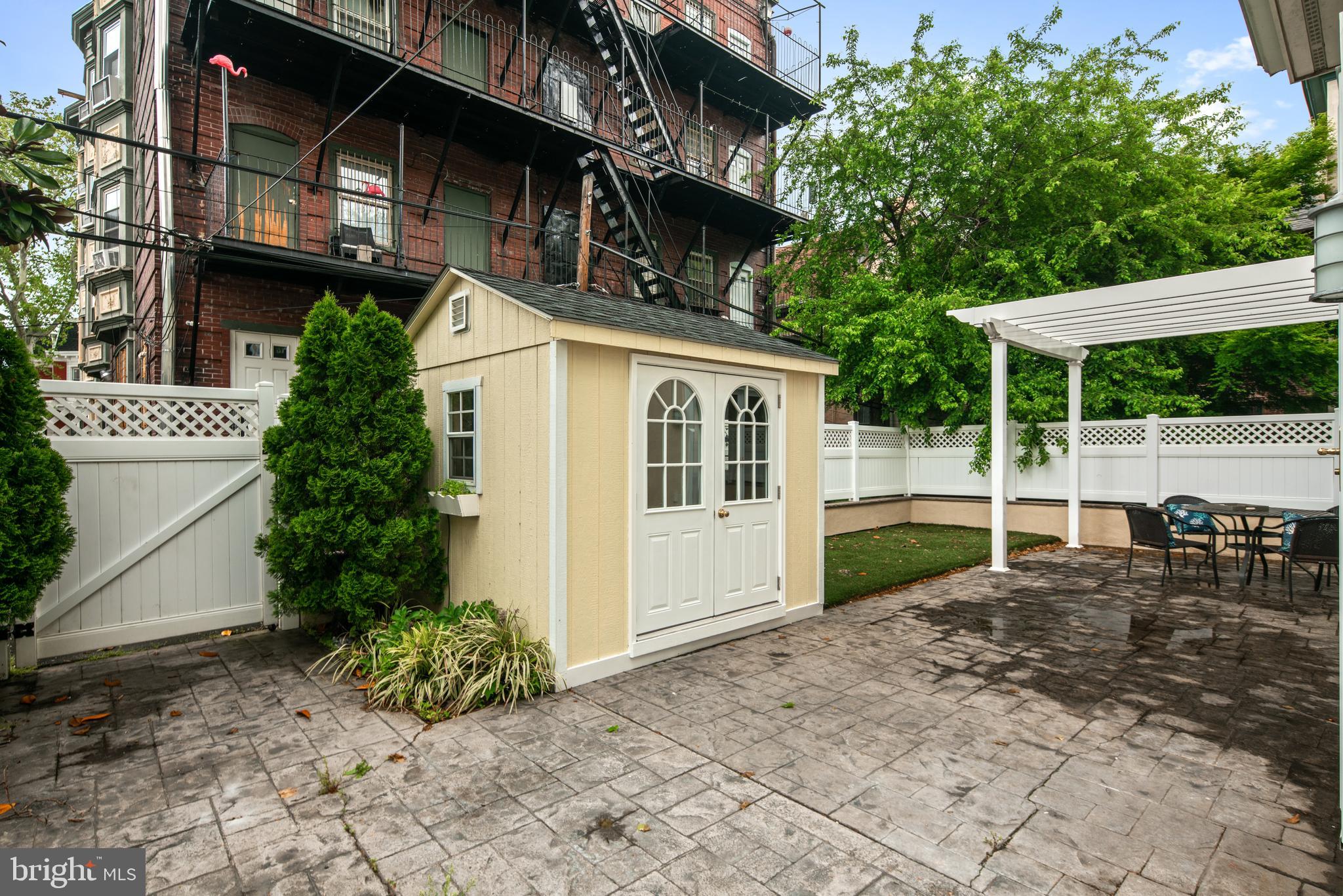 3313 Baring Street Philadelphia, PA 19104 - Photo 55 of 55 a view of a house with backyard and sitting area