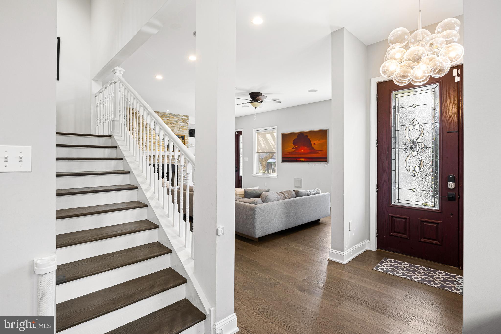 3313 Baring Street Philadelphia, PA 19104 - Photo 10 of 55 a view of entryway with livingroom and chandelier