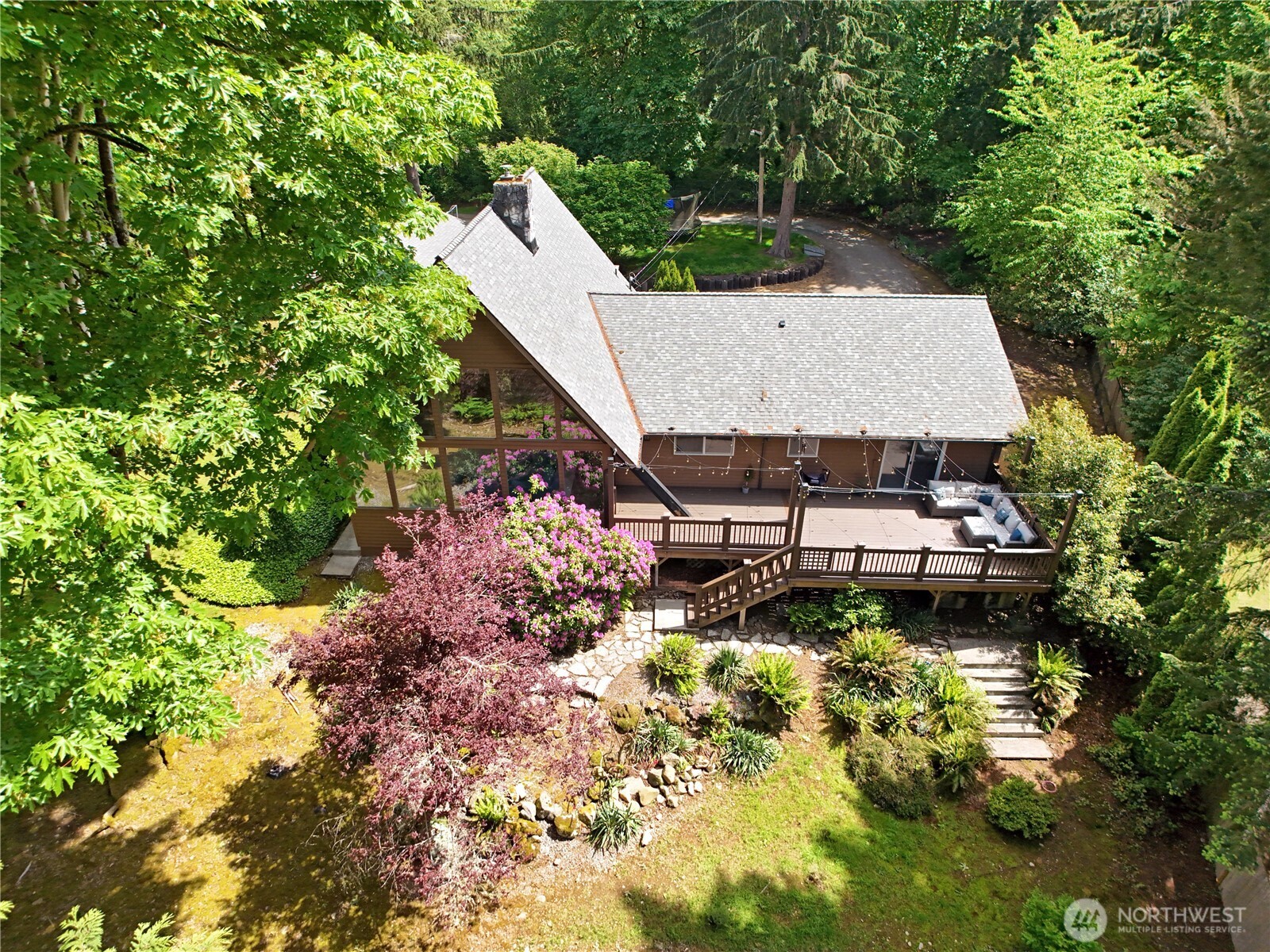 28539 Northeast Tolt Hill Road Carnation, WA 98014 - Photo 3 of 36 an aerial view of a house with a yard potted plants and large tree