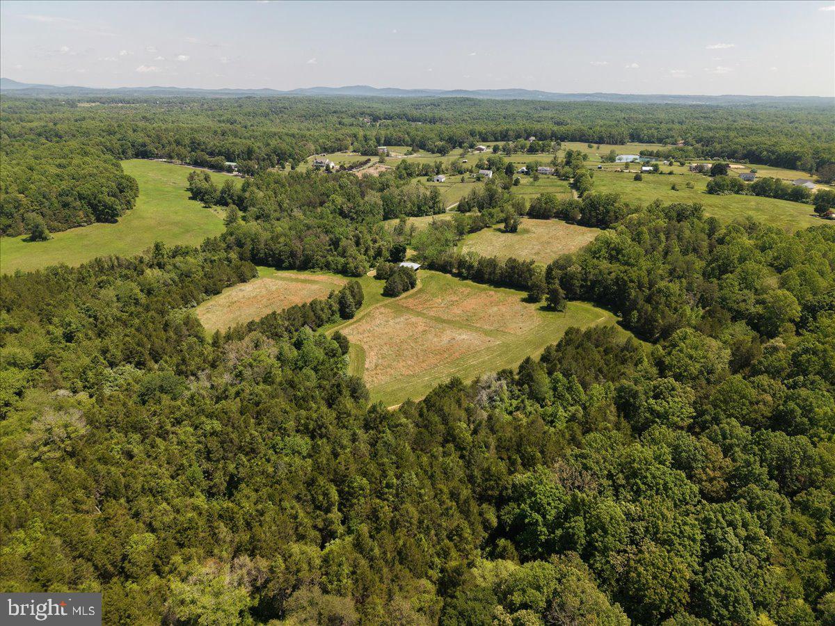 4266 Indian Run Road Amissville, VA 20106 - Photo 13 of 17 an aerial view of residential houses with outdoor space and trees