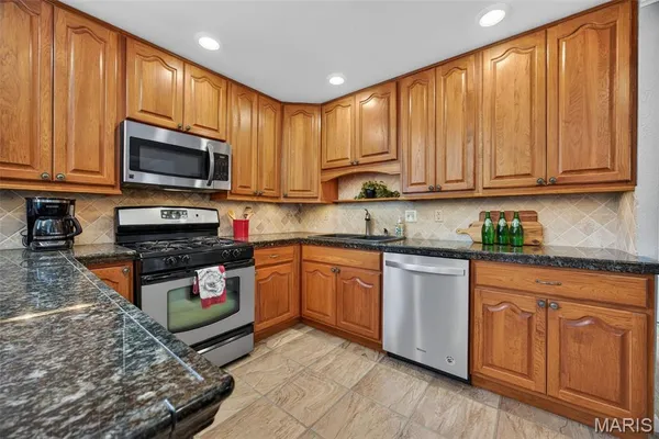 $489,000 | 323 Oakleigh Woods Drive, Ballwin, MO 63011