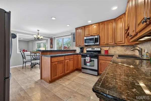 $489,000 | 323 Oakleigh Woods Drive, Ballwin, MO 63011