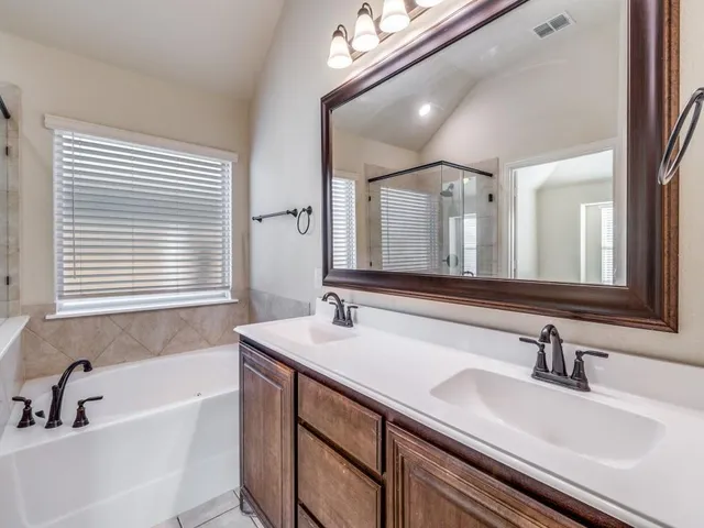 a bathroom with a sink and a bathtub