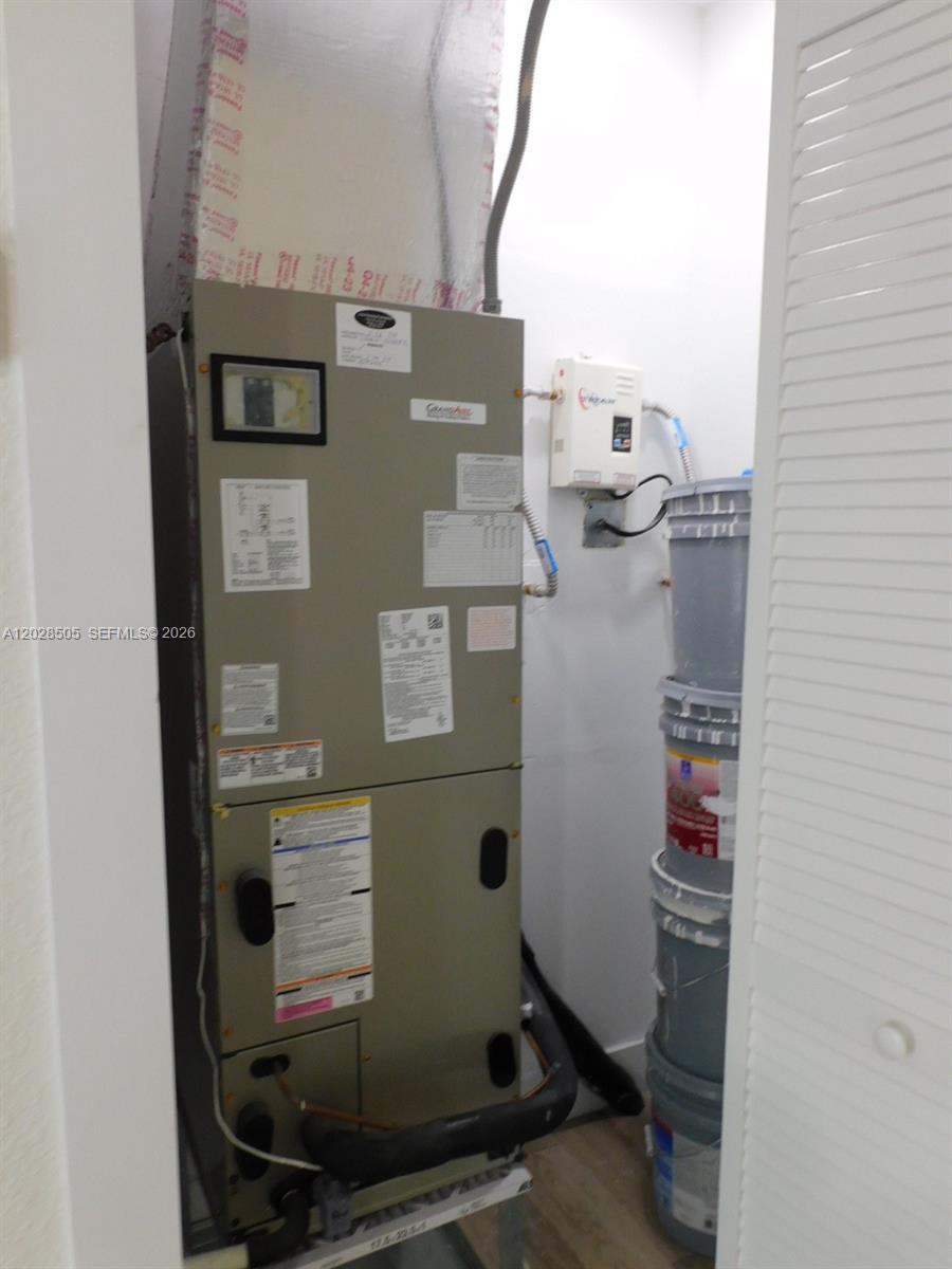 3333 Southwest 89th Avenue Miami, FL 33165 - Photo 37 of 44 Newer A/C and Tankless Water Heater.
