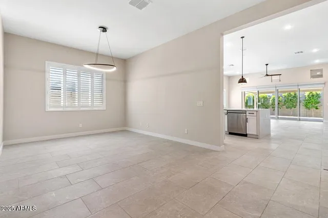 a view of a kitchen with furniture and a window