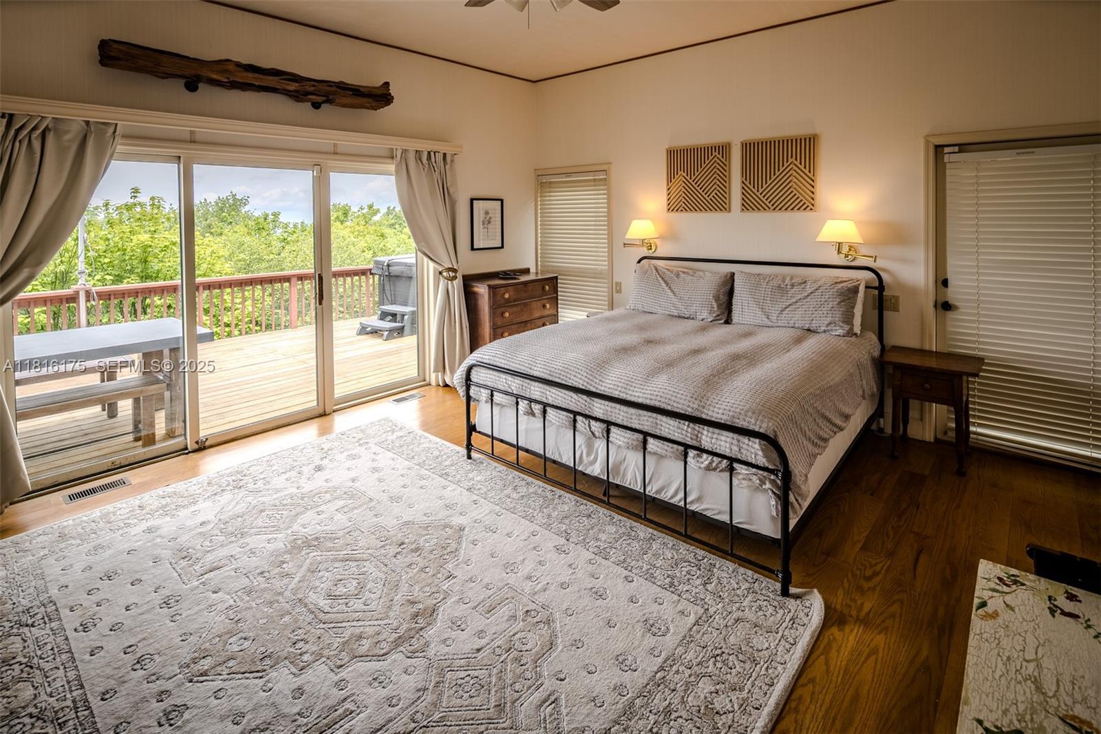200 Summit Lodge Road Banner Elk, NC 28604 - Photo 11 of 51 a spacious bedroom with a bed and a large window