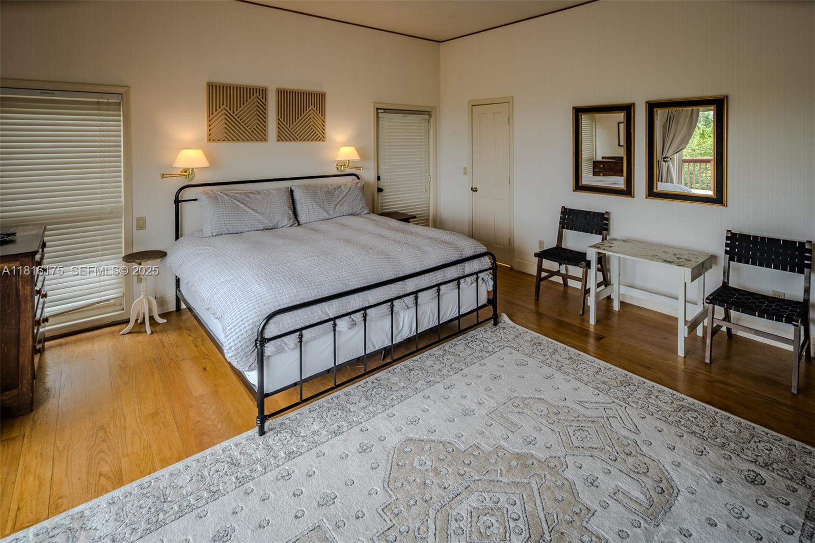 200 Summit Lodge Road Banner Elk, NC 28604 - Photo 13 of 51 a bedroom with a bed a table and chair