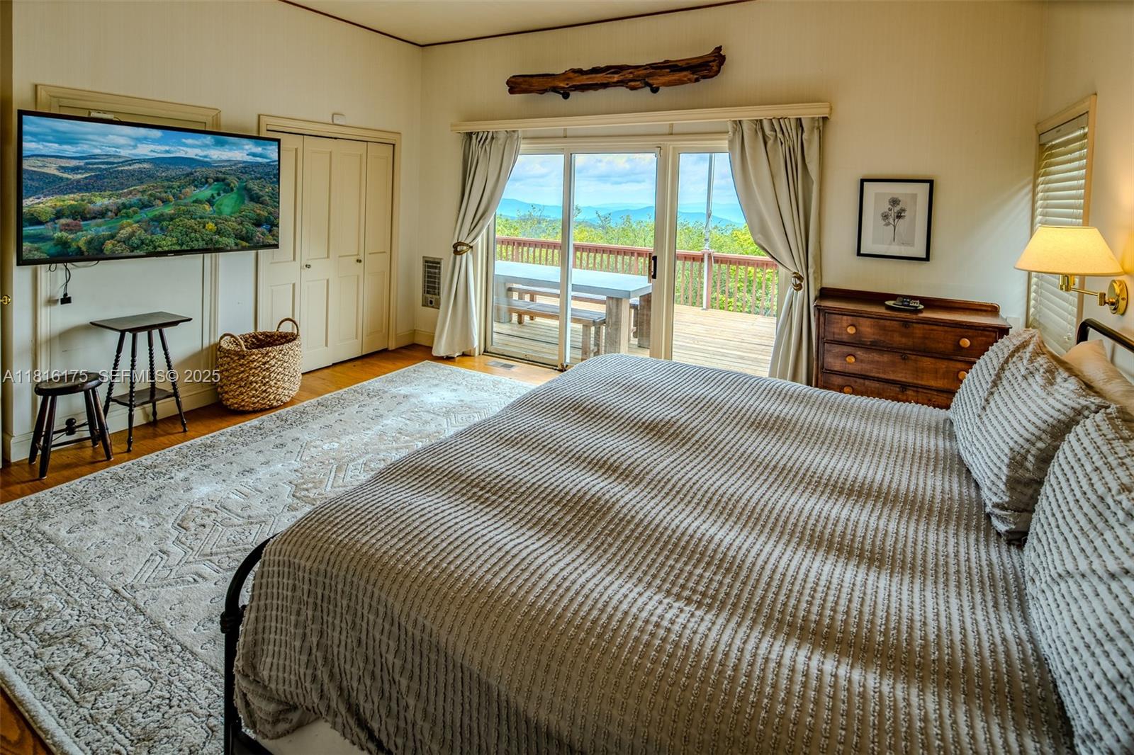 200 Summit Lodge Road Banner Elk, NC 28604 - Photo 14 of 51 a bedroom with a bed and a large window