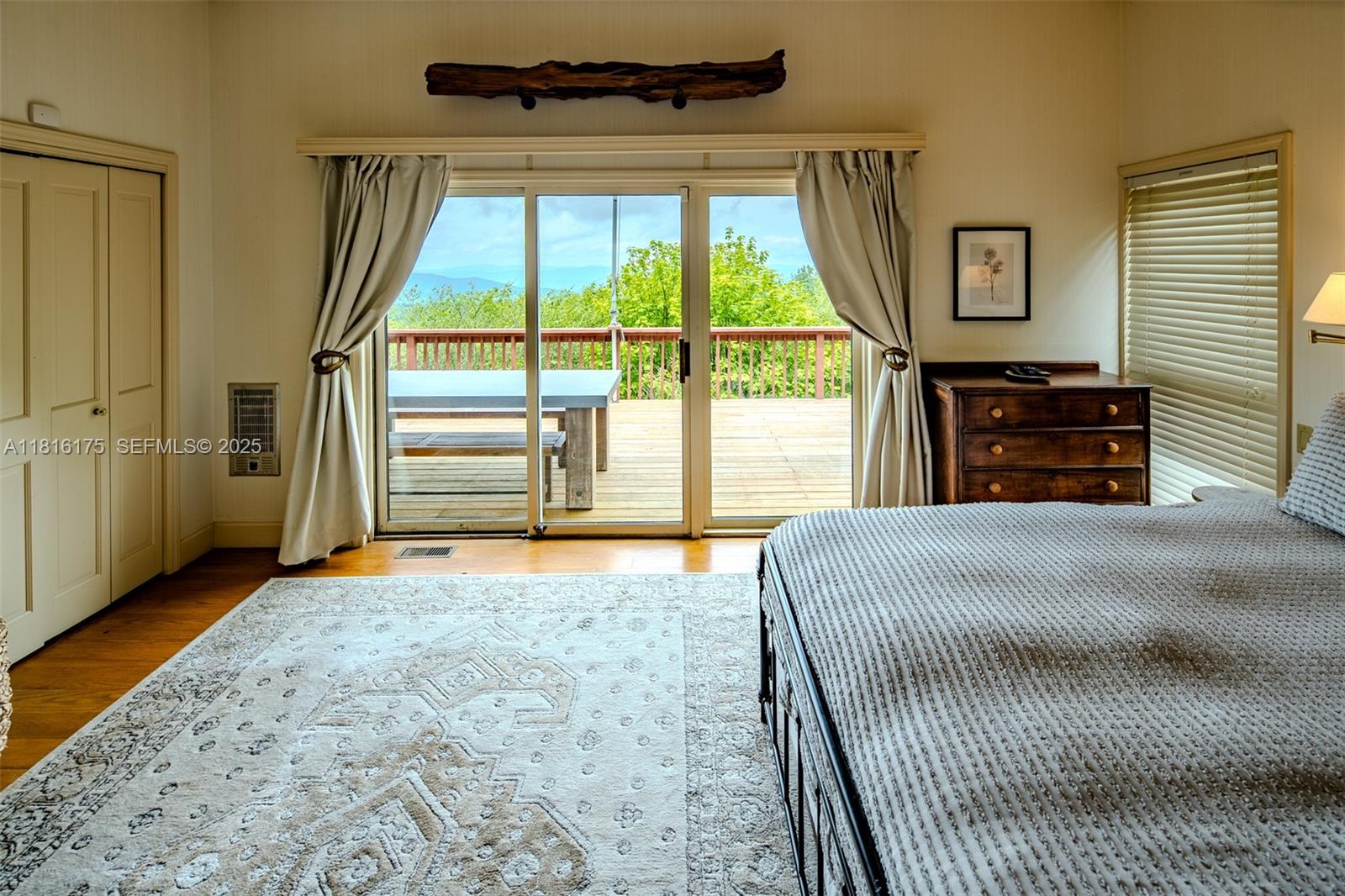 200 Summit Lodge Road Banner Elk, NC 28604 - Photo 15 of 51 a bedroom with a bed and a large window