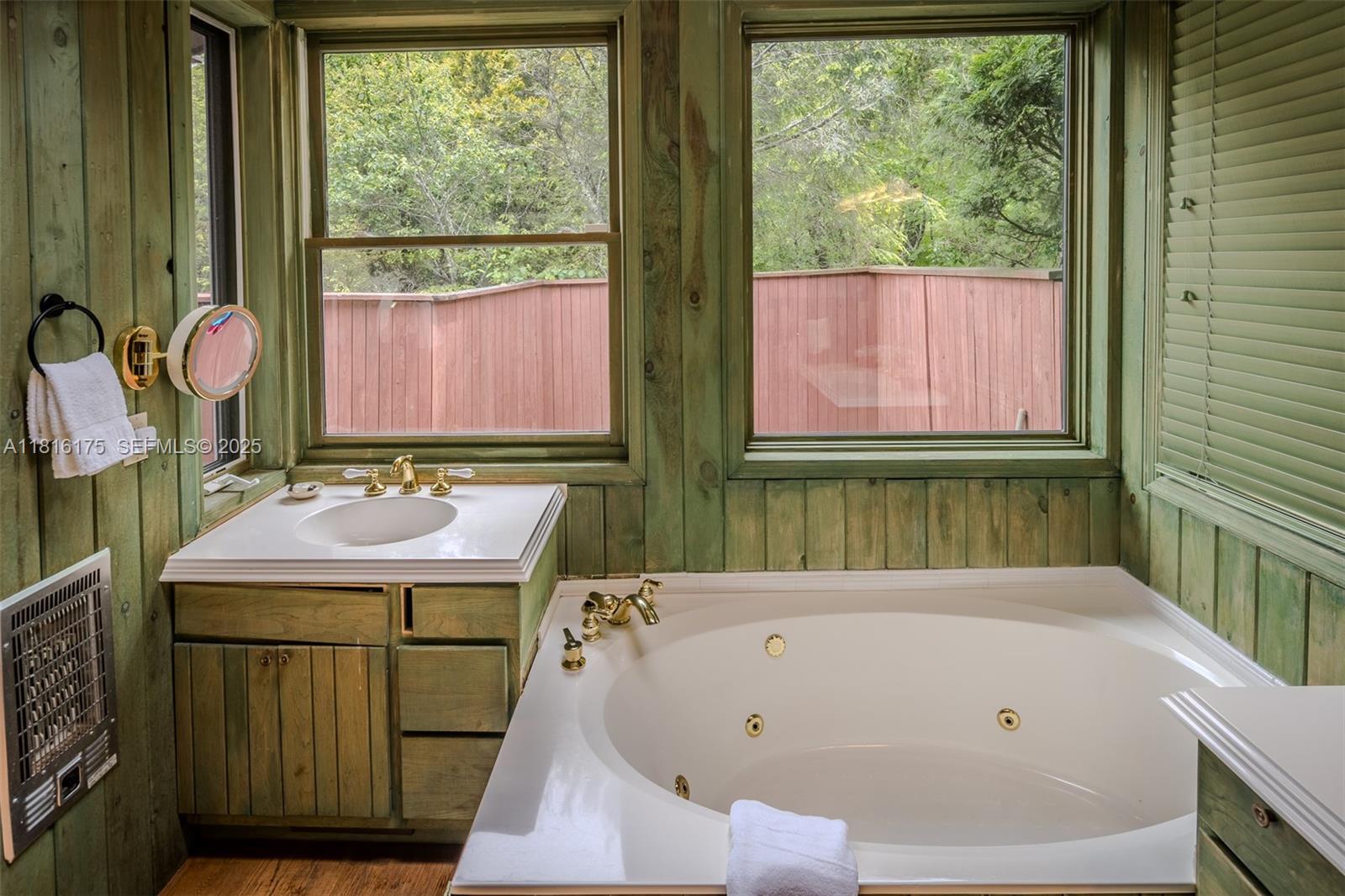 200 Summit Lodge Road Banner Elk, NC 28604 - Photo 17 of 51 a bathroom with a tub sink and window