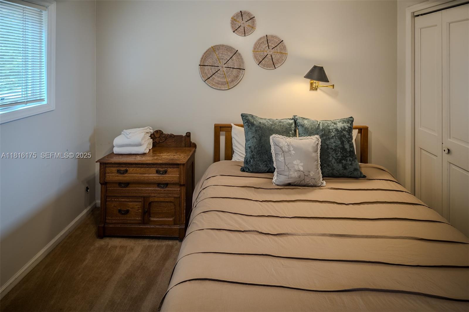 200 Summit Lodge Road Banner Elk, NC 28604 - Photo 19 of 51 a bedroom with a bed and cabinet
