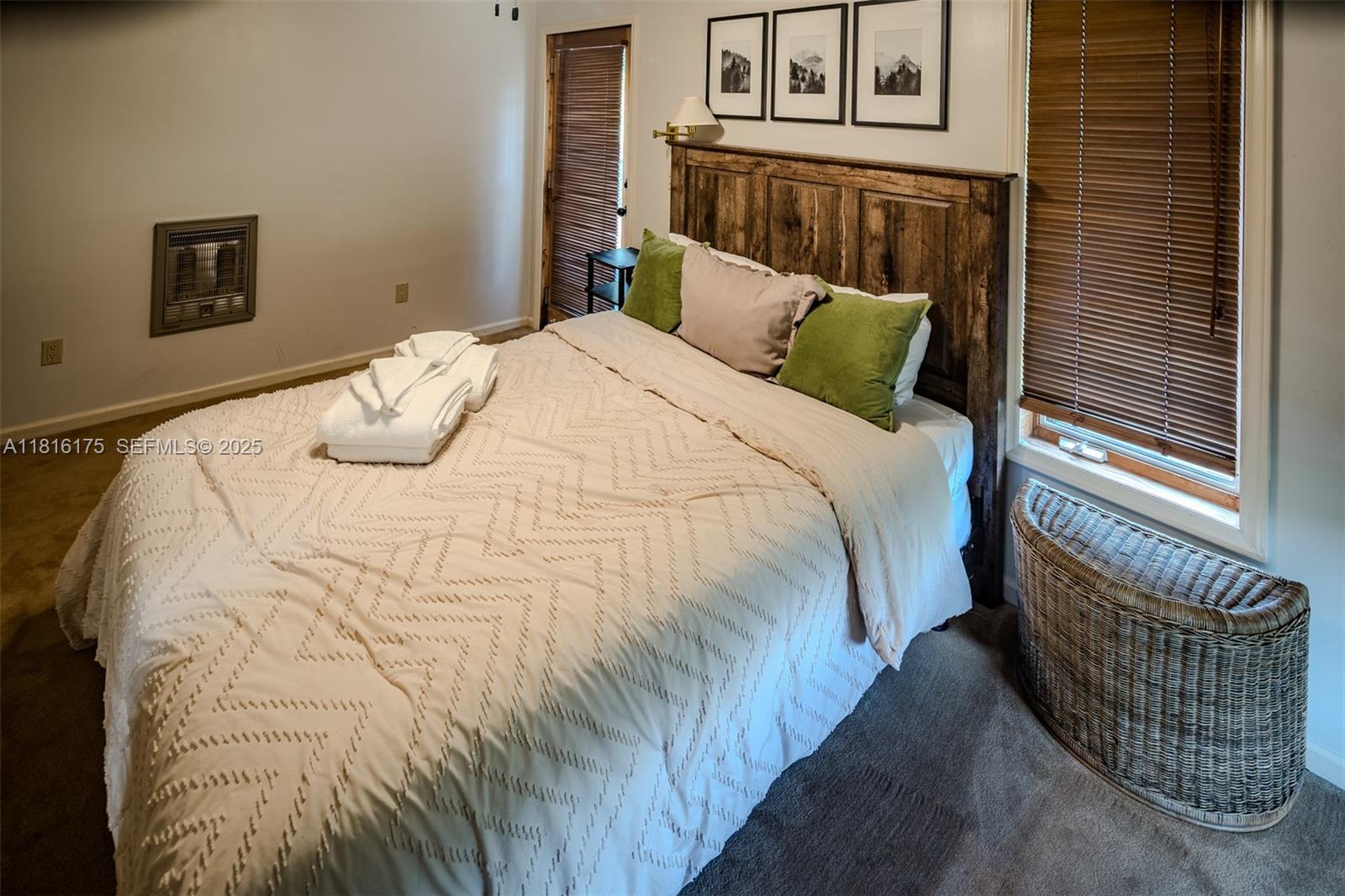 200 Summit Lodge Road Banner Elk, NC 28604 - Photo 23 of 51 a bedroom with a bed and dresser