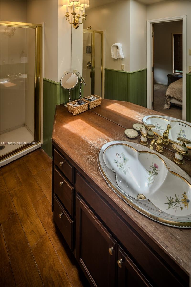 200 Summit Lodge Road Banner Elk, NC 28604 - Photo 24 of 51 a bathroom with a granite countertop sink and a mirror