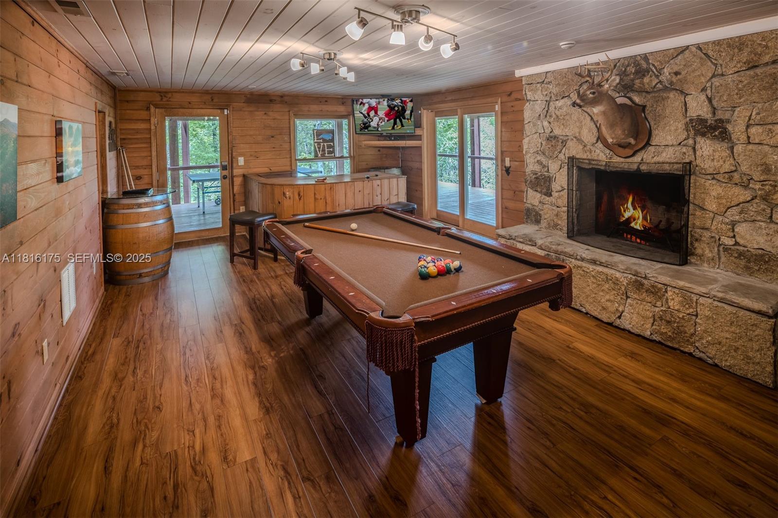 200 Summit Lodge Road Banner Elk, NC 28604 - Photo 26 of 51 a living room with furniture and a fireplace