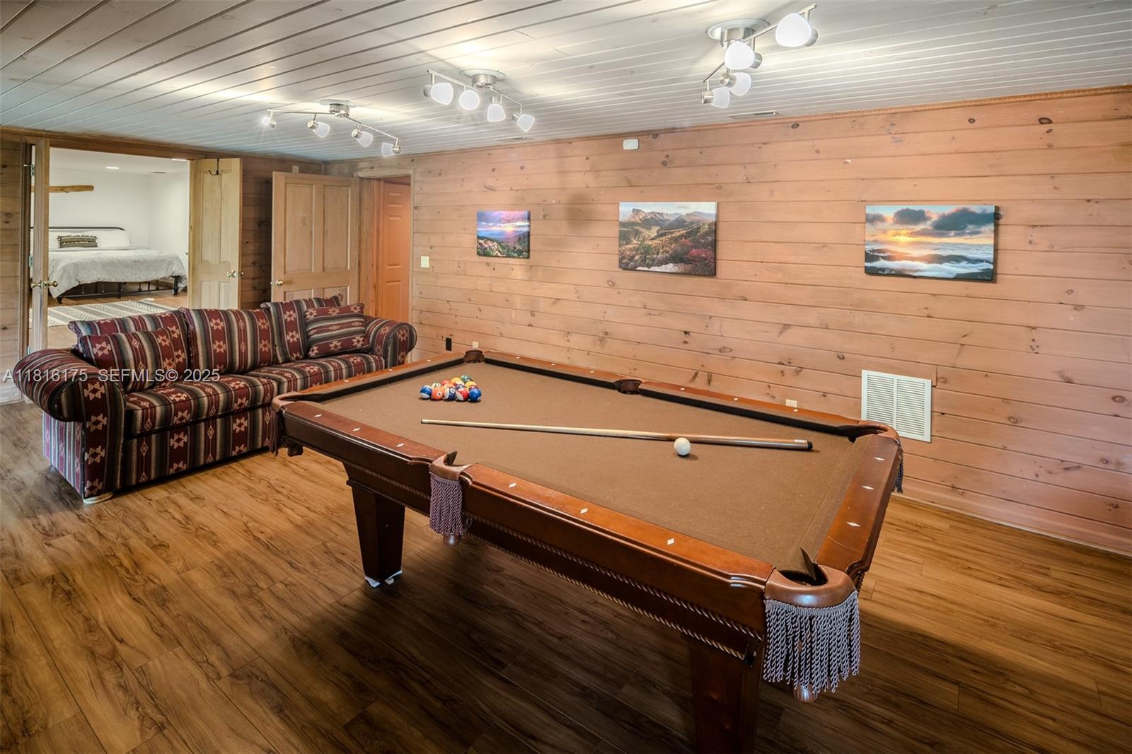 200 Summit Lodge Road Banner Elk, NC 28604 - Photo 29 of 51 a living room with furniture pool table and a wooden floor