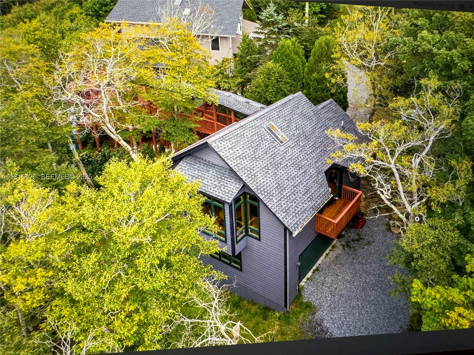 200 Summit Lodge Road Banner Elk, NC 28604 - Photo 46 of 51 front view of a house with a yard