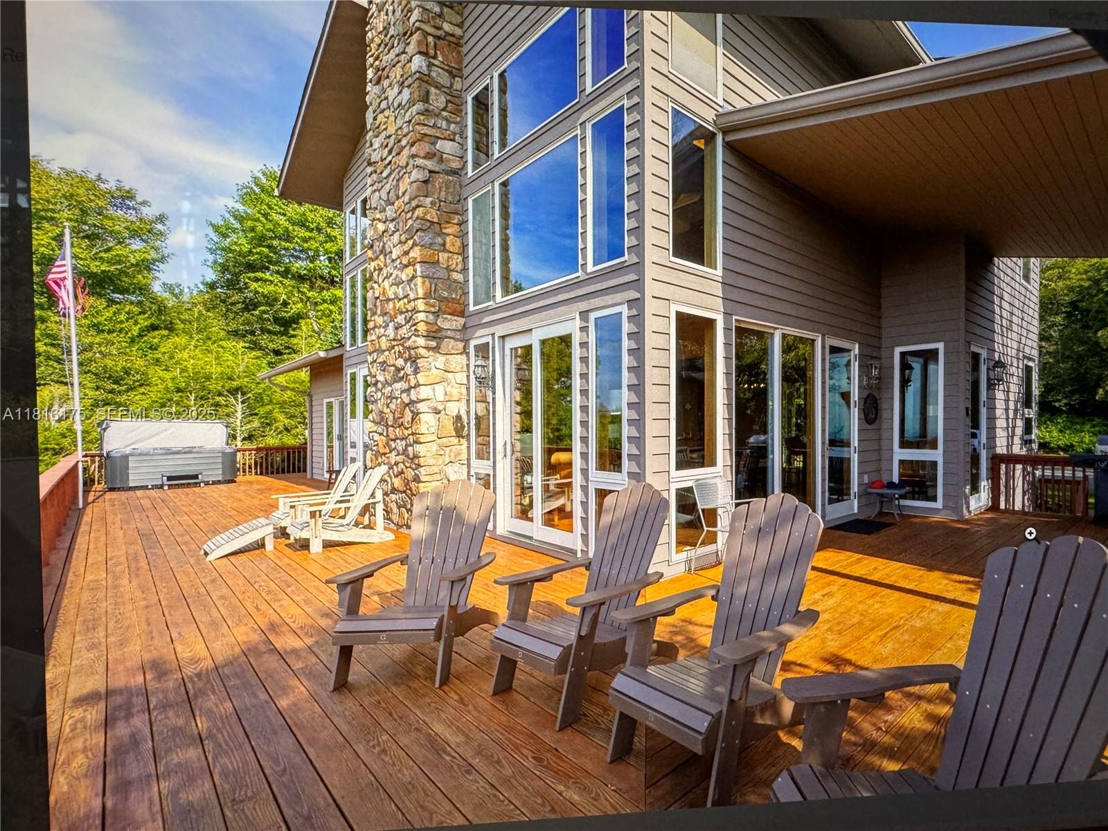 200 Summit Lodge Road Banner Elk, NC 28604 - Photo 48 of 51 a view of a house with backyard and sitting area