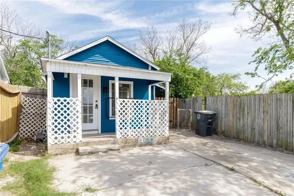 a front view of a house with a garage