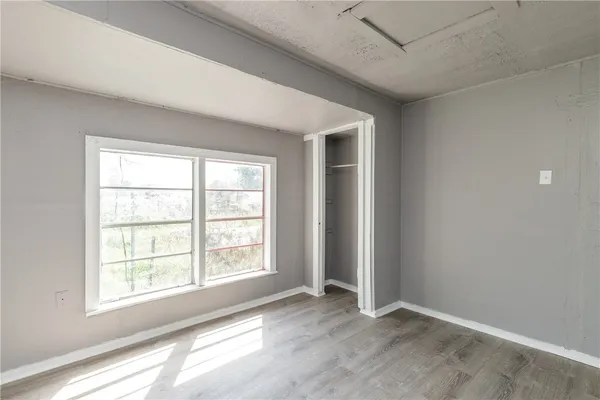 an empty room with windows