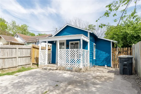 a front view of a house with a garage