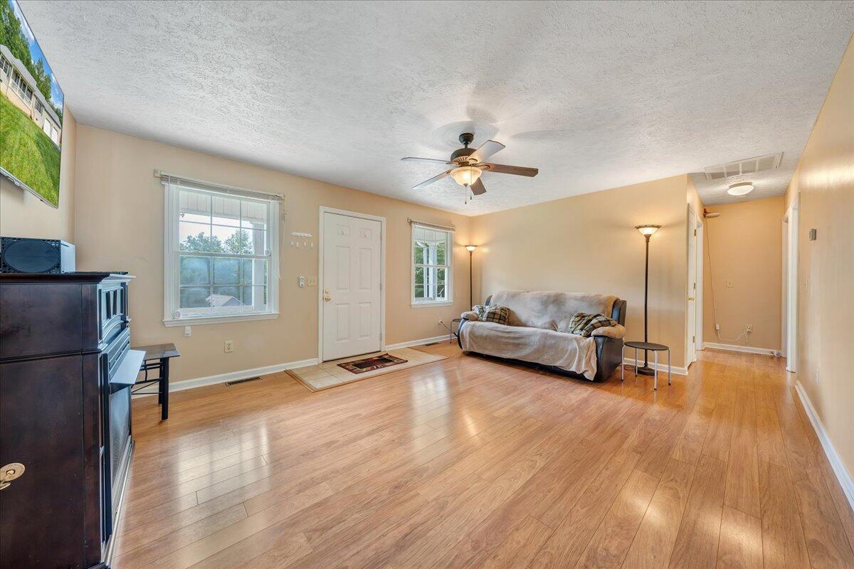 30 Highland Lake Road Union Hall, VA 24176 - Photo 5 of 51 a living room with furniture and a wooden floor