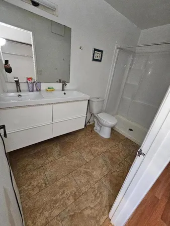 a bathroom with a sink and a toilet