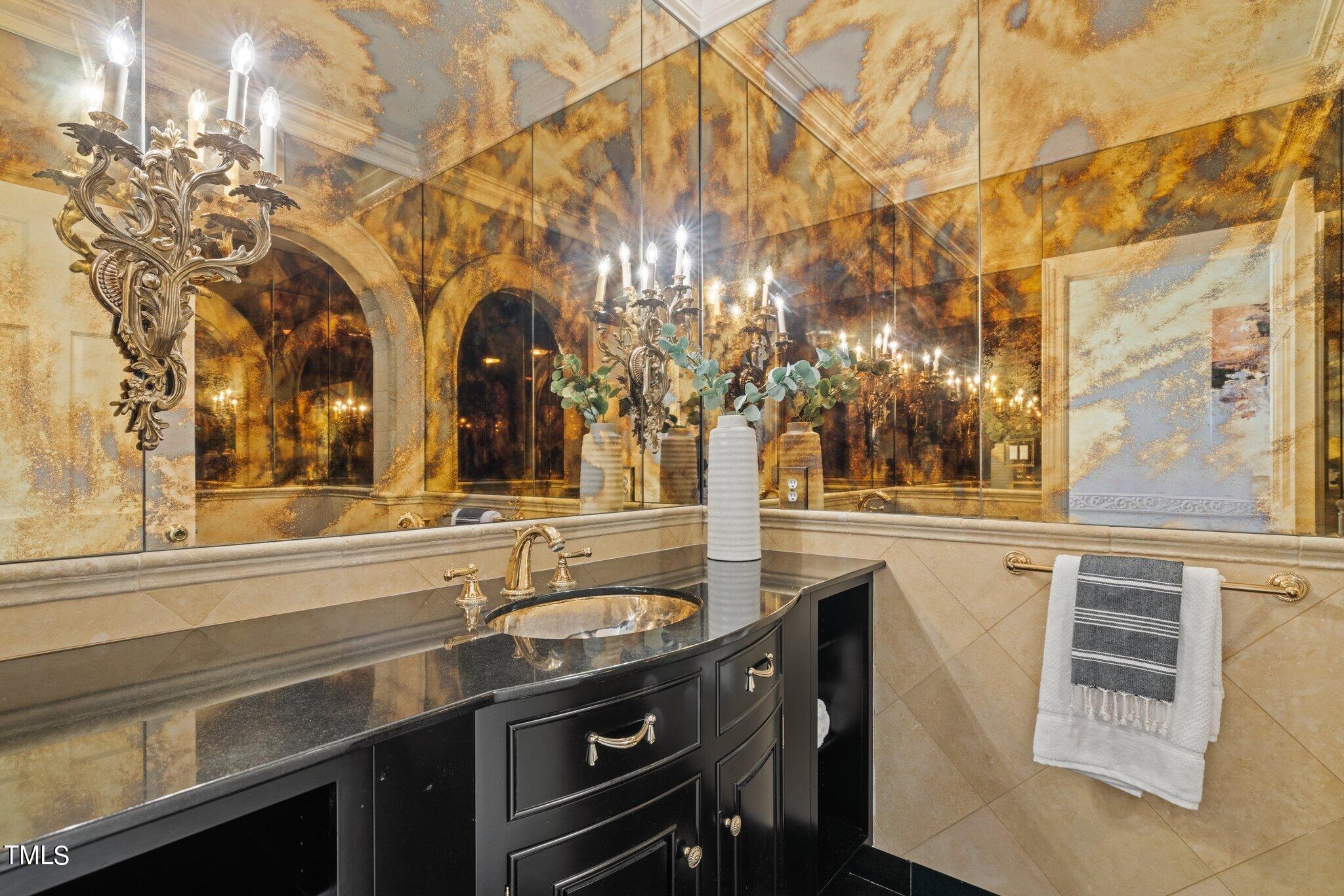 202 Villa Drive Durham, NC 27712 - Photo 18 of 53 a bathroom with a sink and large mirror