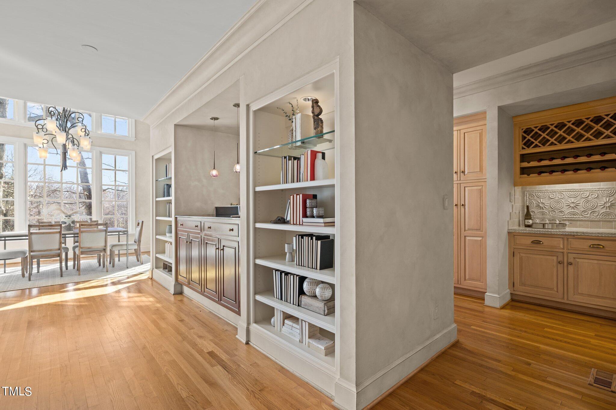 202 Villa Drive Durham, NC 27712 - Photo 19 of 53 a view of an empty room with window and wooden floor