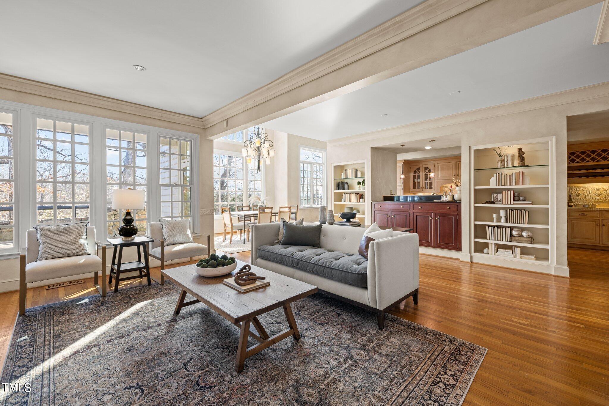 202 Villa Drive Durham, NC 27712 - Photo 22 of 53 a living room with furniture and hard wood flooring