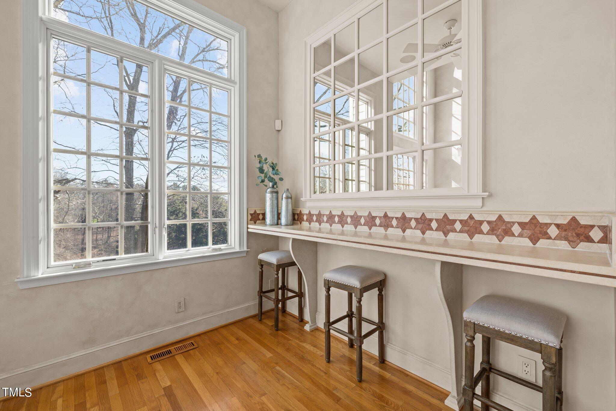 202 Villa Drive Durham, NC 27712 - Photo 27 of 53 a white kitchen with a sink and cabinets
