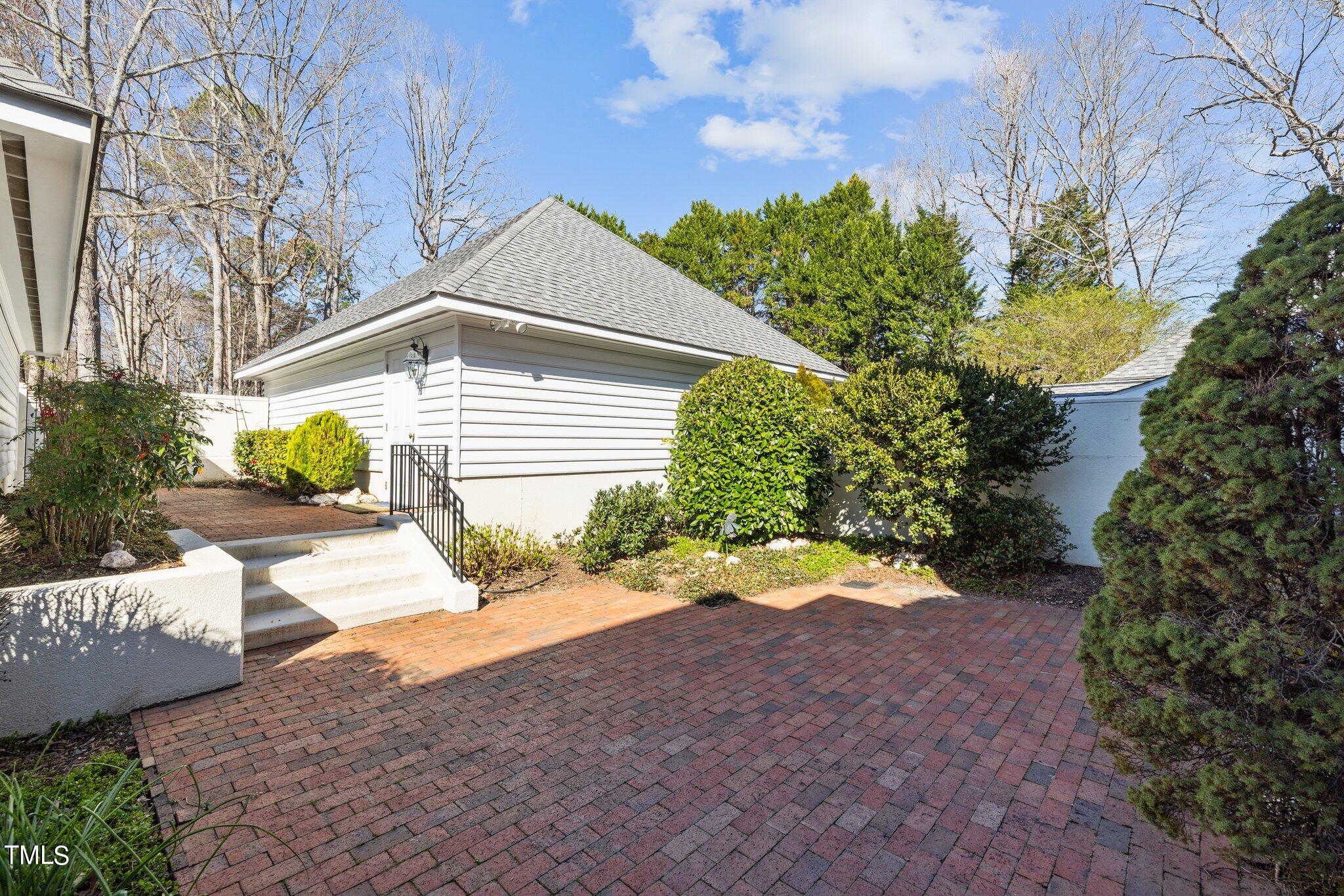 202 Villa Drive Durham, NC 27712 - Photo 3 of 53 a front view of a house with garden