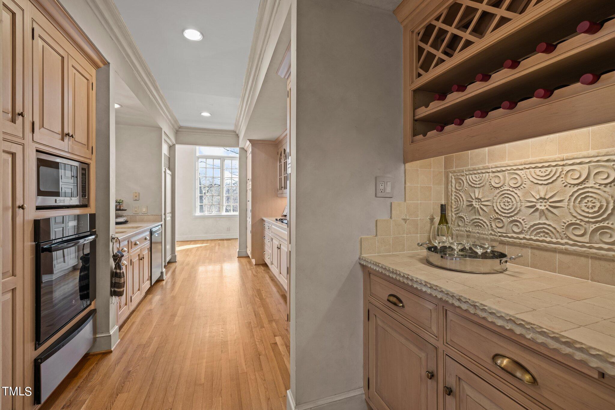 202 Villa Drive Durham, NC 27712 - Photo 32 of 53 a view of a kitchen cabinets and wooden floor