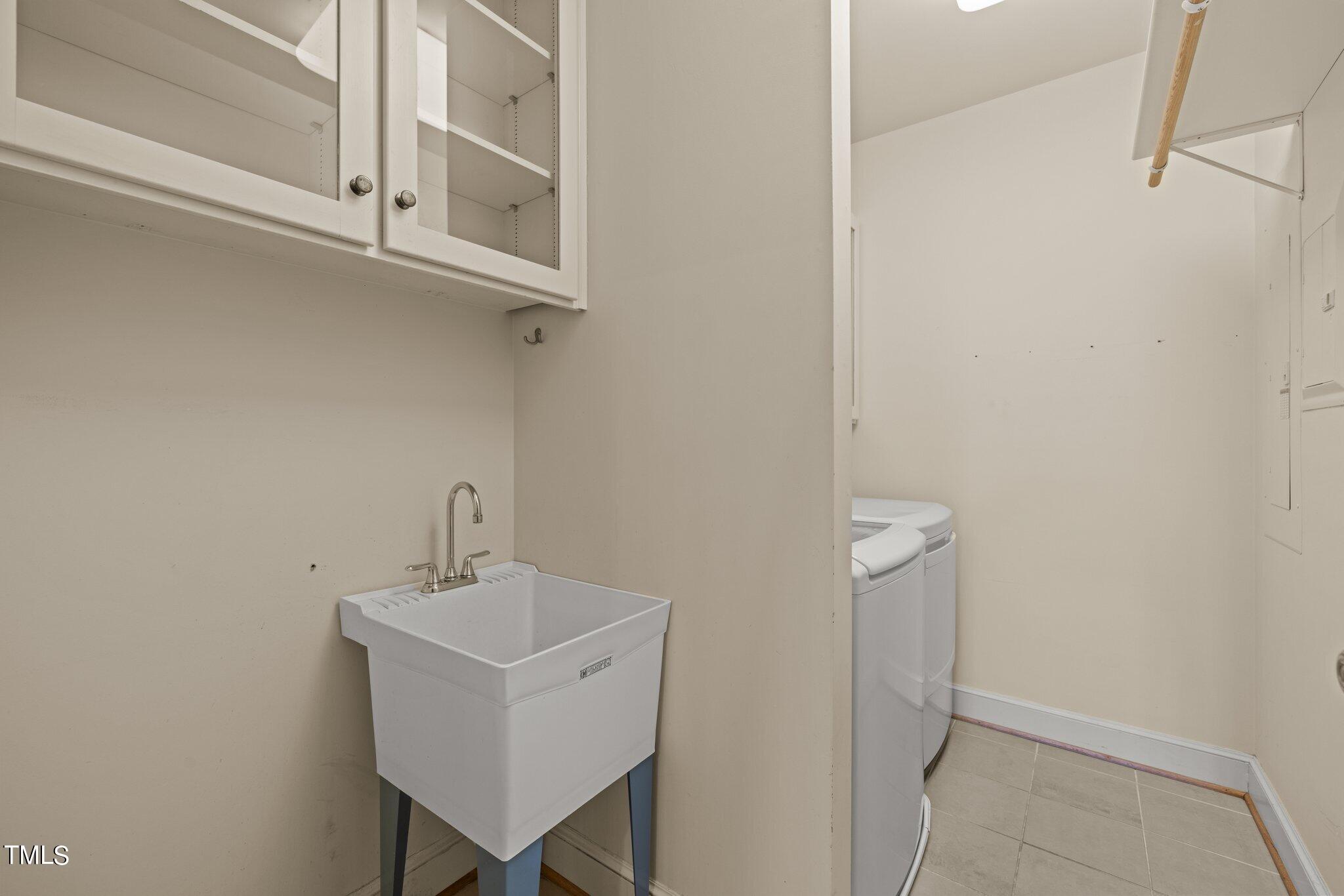 202 Villa Drive Durham, NC 27712 - Photo 33 of 53 a utility room with dryer and washer