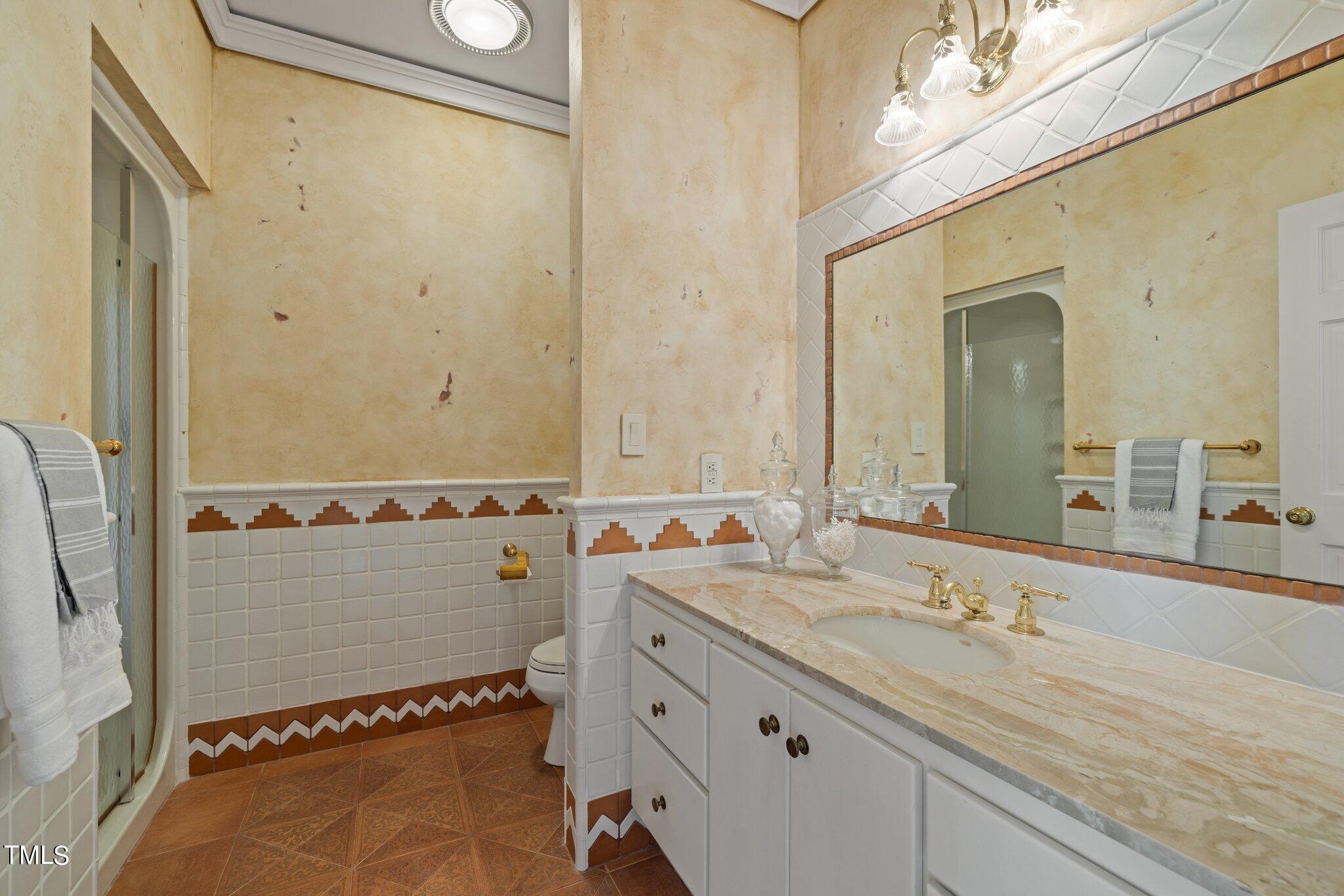 202 Villa Drive Durham, NC 27712 - Photo 41 of 53 a bathroom with a granite countertop sink mirror and double
