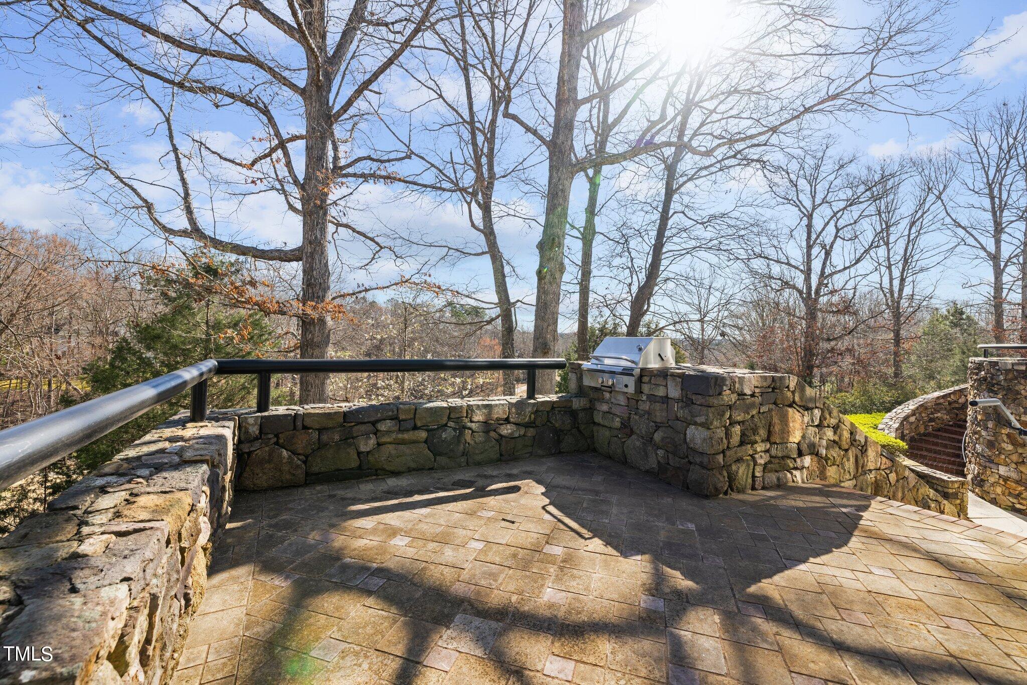 202 Villa Drive Durham, NC 27712 - Photo 47 of 53 a view of balcony with wooden floor and fence