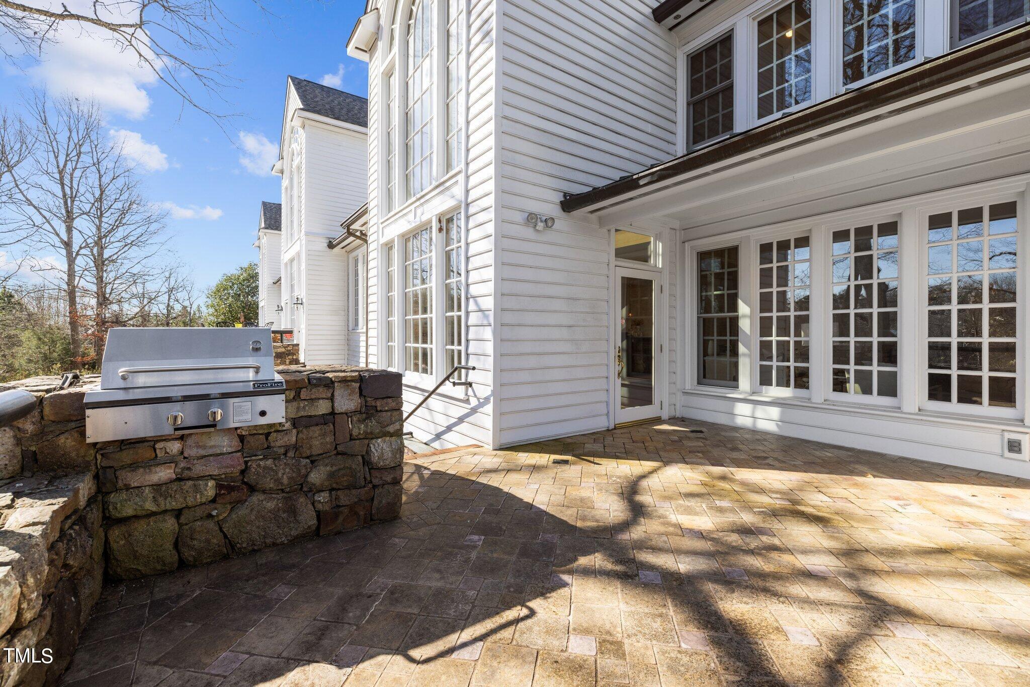 202 Villa Drive Durham, NC 27712 - Photo 50 of 53 a view of a porch with a bench in front of house