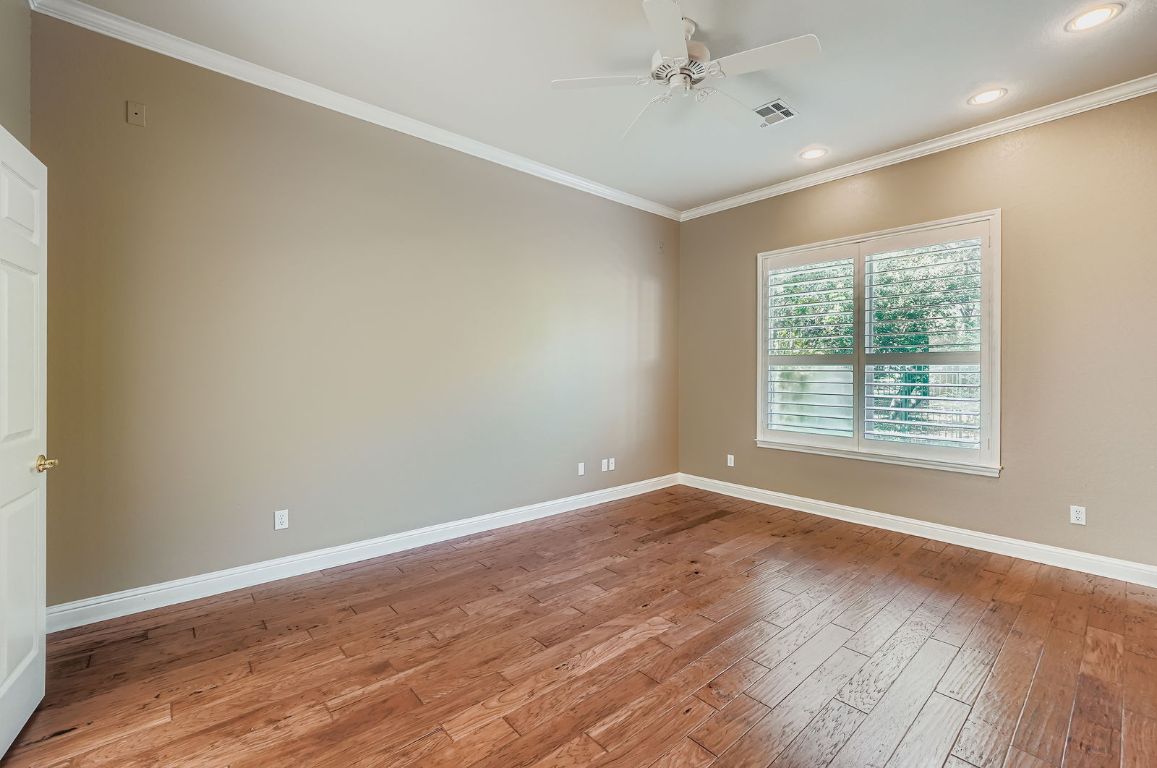 5000 Mission Oaks Boulevard, Unit 61 Austin, TX 78735 - Photo 13 of 27 Unfurnished room featuring crown molding, light wood-type flooring, ceiling fan, and recessed lighting