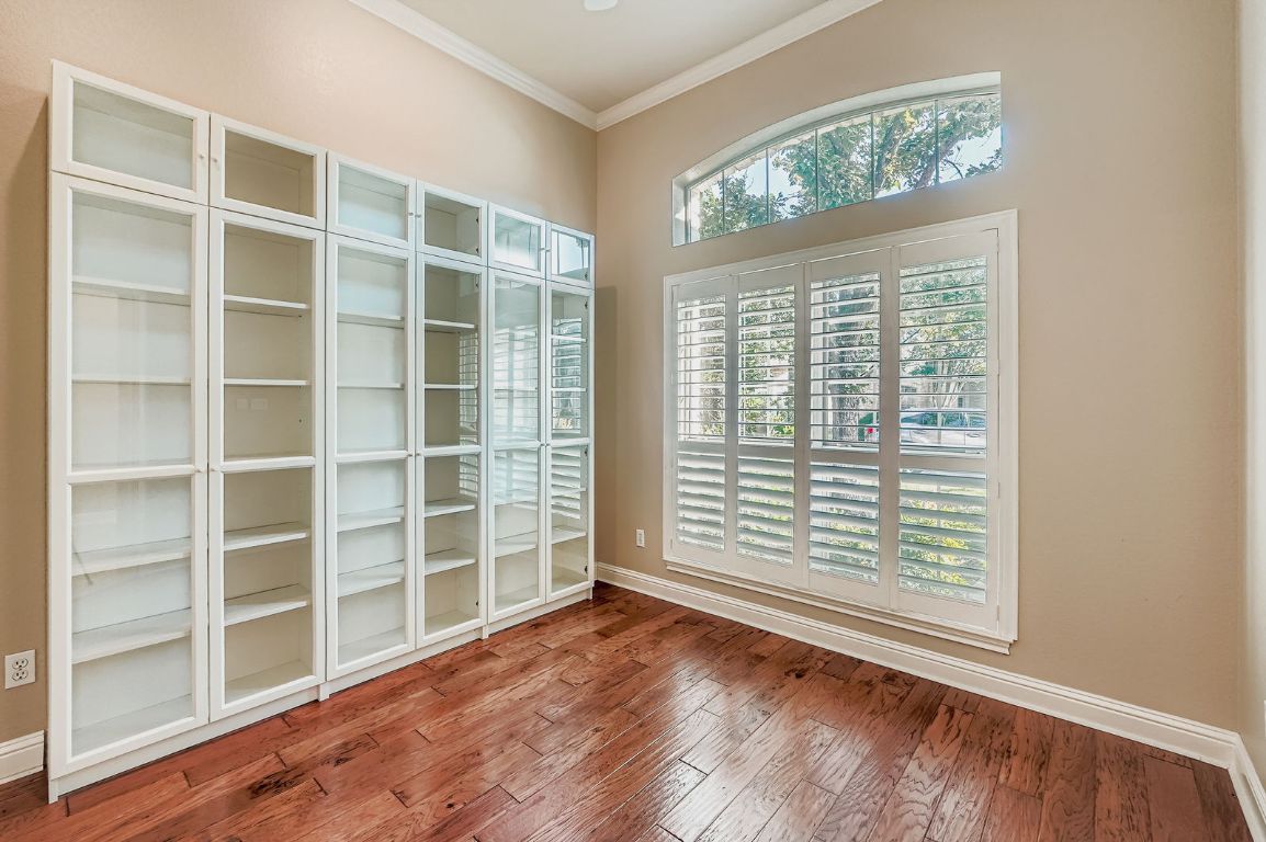 5000 Mission Oaks Boulevard, Unit 61 Austin, TX 78735 - Photo 9 of 27 Office with crown molding and hardwood / wood-style floors